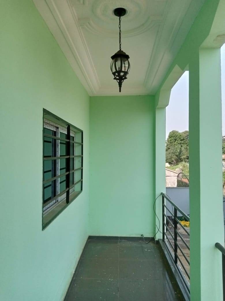 Private balcony with lantern light and metal railing