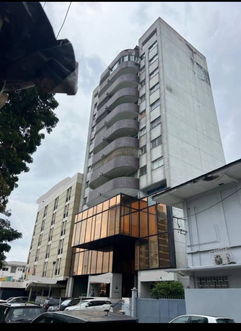 Exterior of the R+12 mixed-use building for sale in Akwa, Douala